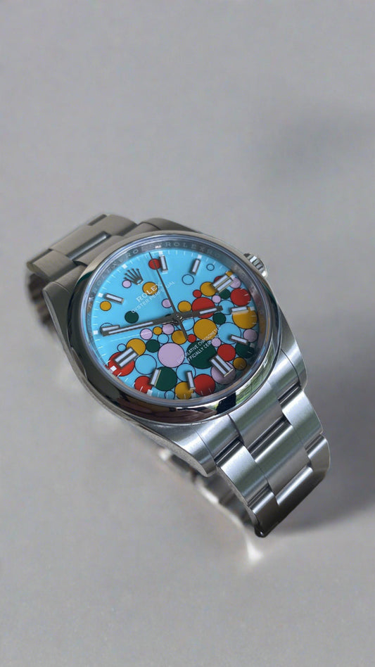 Rolex Oyster Perpetual 41 Watch - Domed Bezel - Turquoise Blue Celebration Motif Index Dial - Oyster Bracelet