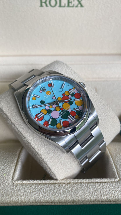 Rolex Oyster Perpetual 41 Watch - Domed Bezel - Turquoise Blue Celebration Motif Index Dial - Oyster Bracelet